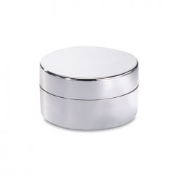 Vanilla flavoured lip balm in a shiny silver round box
